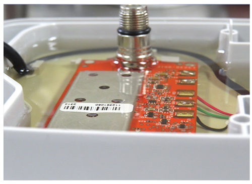 Electronics are protected against water and alteration with a layer of hard clear epoxy potted in place. The barcode can be read through the epoxy layer.